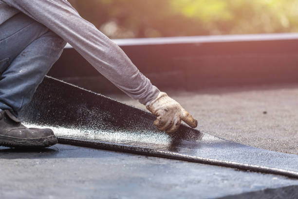 Professional Basement Waterproofing technician working in Fremont, IN